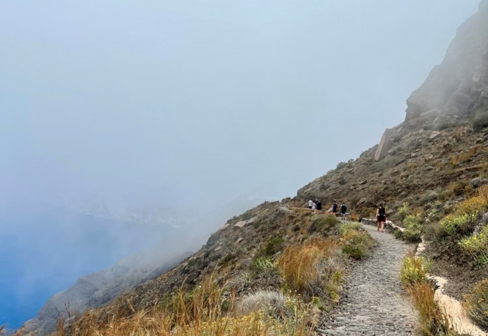 Steven Sarrel hiking from Fira to Oia in Santorini, Greece